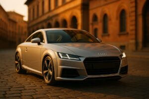 Audi TT Coupé usata parcheggiata su strada storica italiana in noleggio a lungo termine